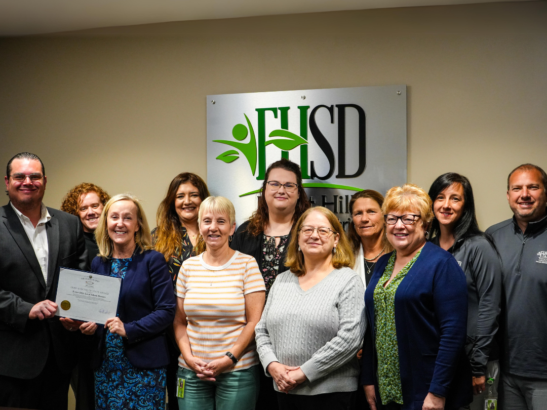 The FHSD Treasurer's Department poses for a photo with Auditor of State rep